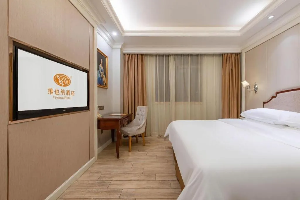 Bed in Vienna Hotel Guangzhou Baiyun College Jinyuan Plaza