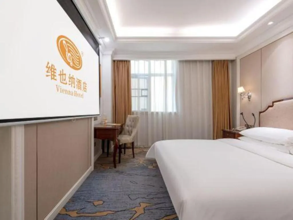 Bed in Vienna Hotel Guangzhou Baiyun College Jinyuan Plaza
