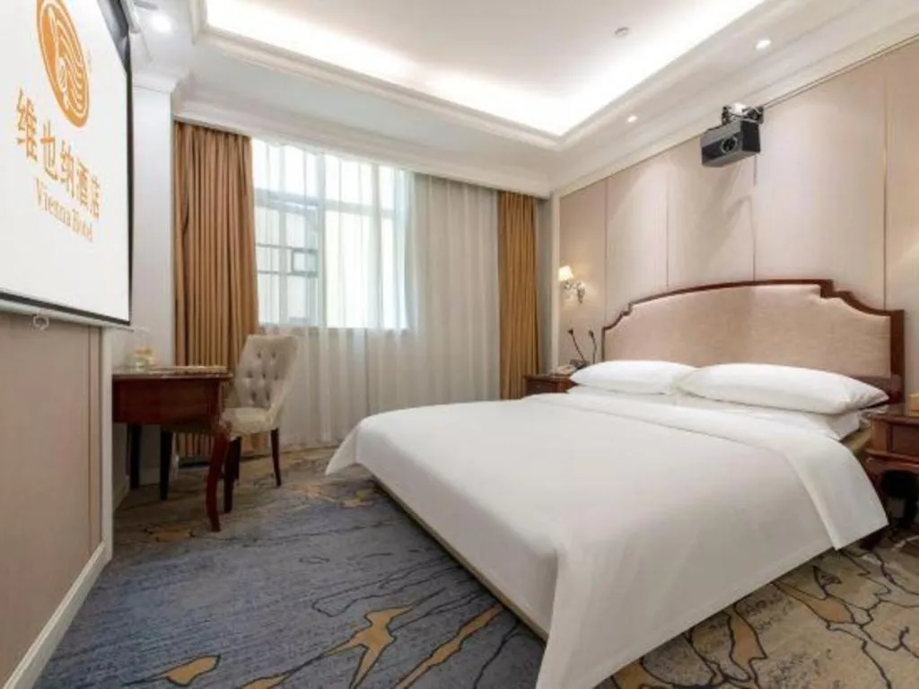 Bed in Vienna Hotel Guangzhou Baiyun College Jinyuan Plaza