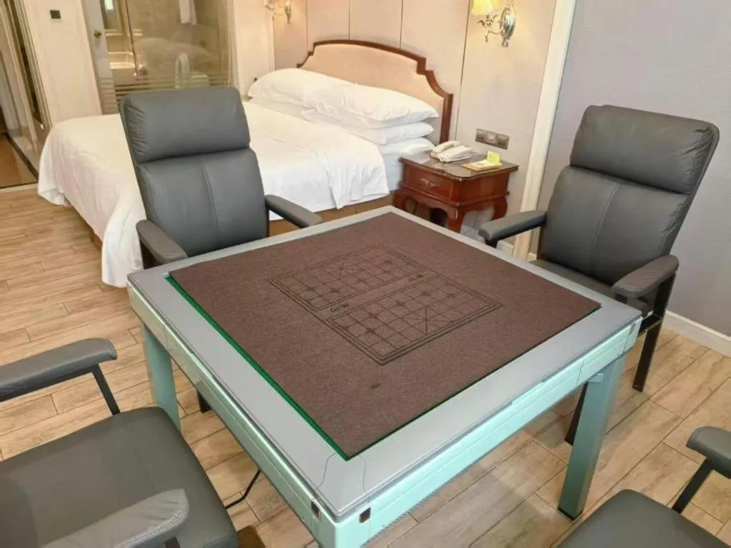 Bed in Vienna Hotel Guangzhou Baiyun College Jinyuan Plaza