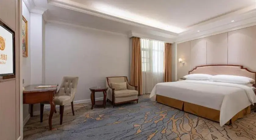 Bed in Vienna Hotel Guangzhou Baiyun College Jinyuan Plaza Bed in Vienna Hotel Guangzhou Baiyun College Jinyuan Plaza