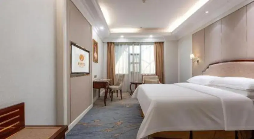 Bed in Vienna Hotel Guangzhou Baiyun College Jinyuan Plaza Bed in Vienna Hotel Guangzhou Baiyun College Jinyuan Plaza