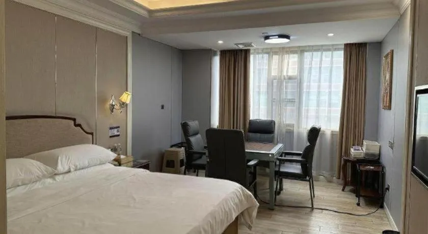 Bed in Vienna Hotel Guangzhou Baiyun College Jinyuan Plaza