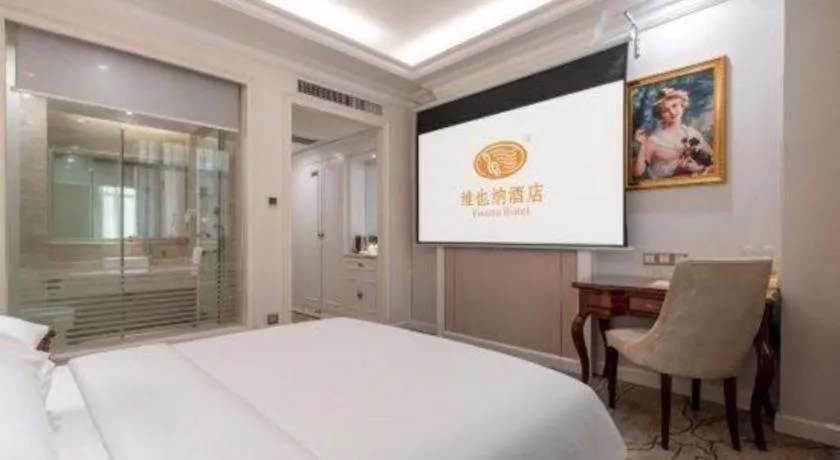 Bed in Vienna Hotel Guangzhou Baiyun College Jinyuan Plaza