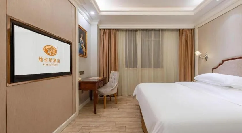 Bed in Vienna Hotel Guangzhou Baiyun College Jinyuan Plaza