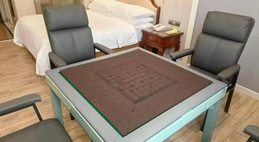 Bed in Vienna Hotel Guangzhou Baiyun College Jinyuan Plaza