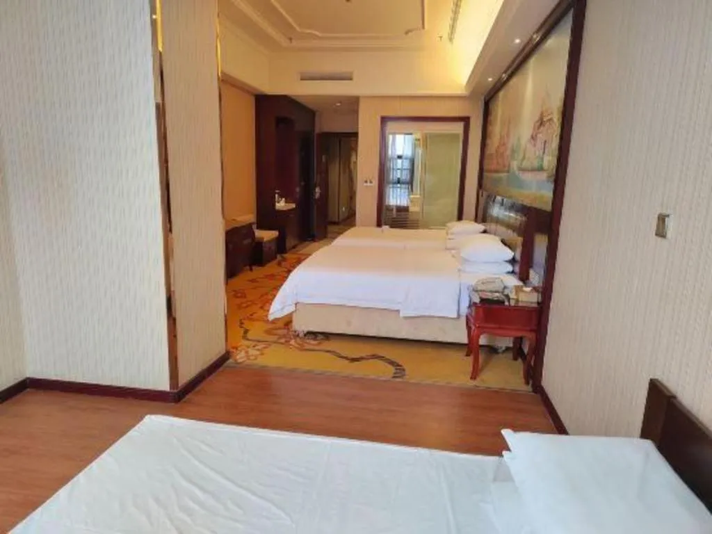 Bed in Vienna Hotel Jiangxi Ji'an Anfu