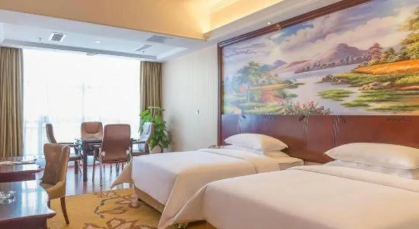 Bed in Vienna Hotel Jiangxi Ji'an Anfu