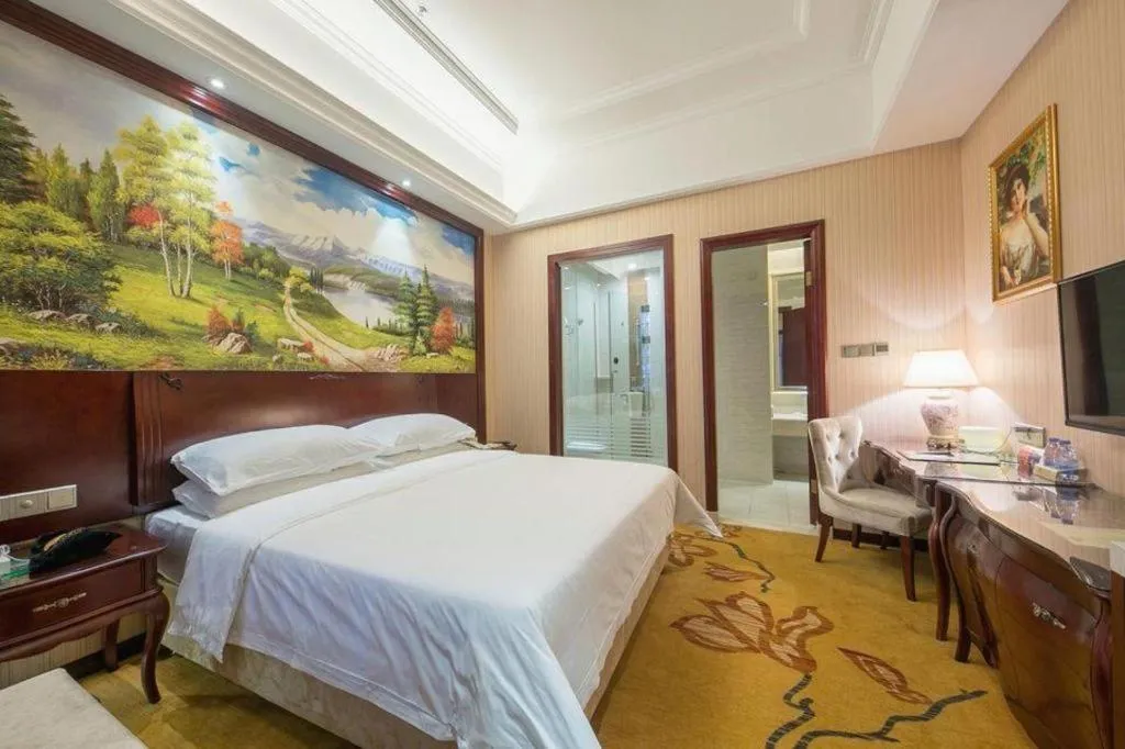 Bed in Vienna Hotel Jiangxi Ji'an Anfu