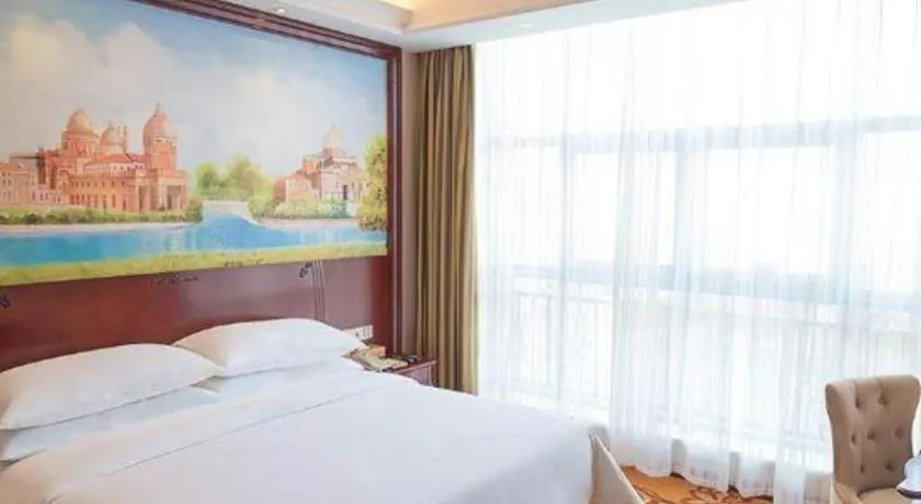 Bed in Vienna Hotel Jiangxi Ji'an Anfu