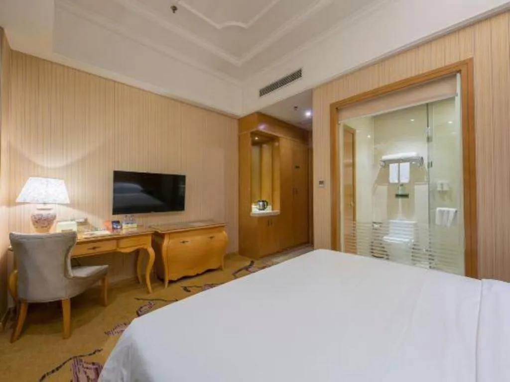 Bed in Vienna Hotel Jiangxi Ji'an Anfu