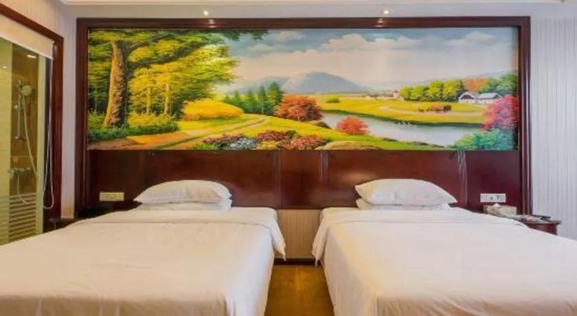 Bed in Vienna Hotel Jiangxi Ji'an Anfu