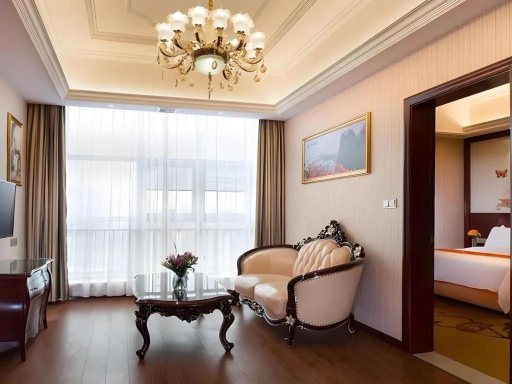 Bed in Vienna Hotel Jiangxi Ji'an Anfu