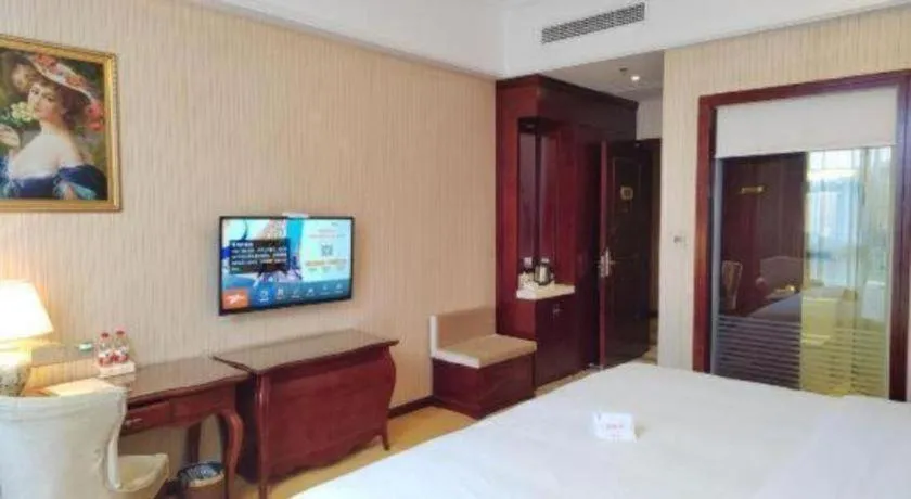 Bed in Vienna Hotel Jiangxi Ji'an Anfu