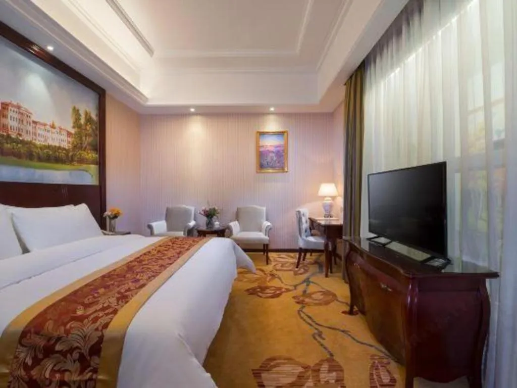 Bed in Vienna Hotel Jiangxi Ji'an Anfu