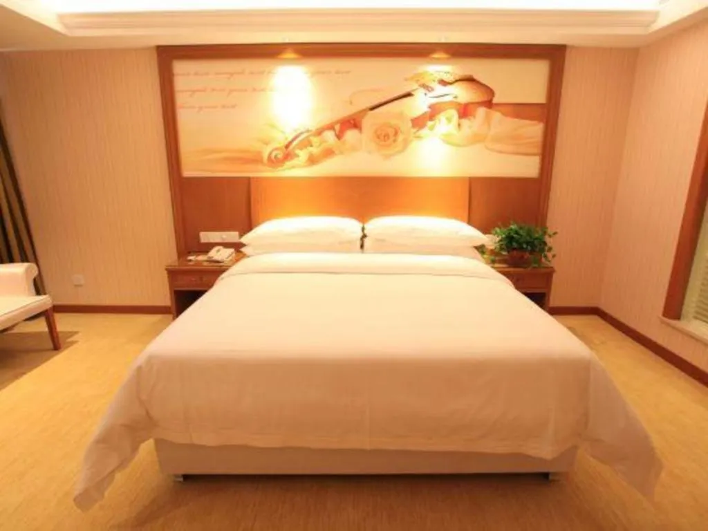 Bed in Vienna Hotel Jiangxi Ji'an Anfu