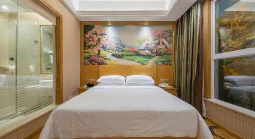 Bed in Vienna Hotel Jiangxi Ji'an Anfu