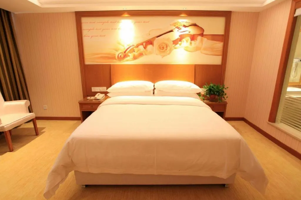 Bed in Vienna Hotel Jiangxi Ji'an Anfu