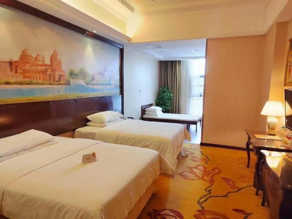 Bed in Vienna Hotel Jiangxi Ji'an Anfu