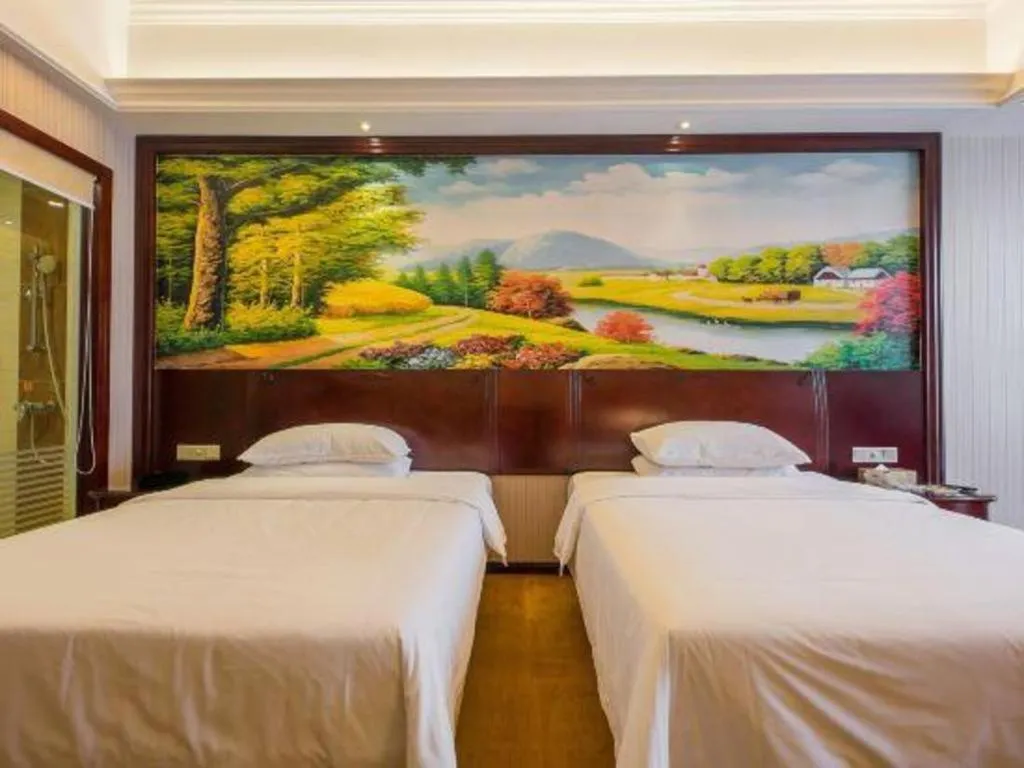 Bed in Vienna Hotel Jiangxi Ji'an Anfu