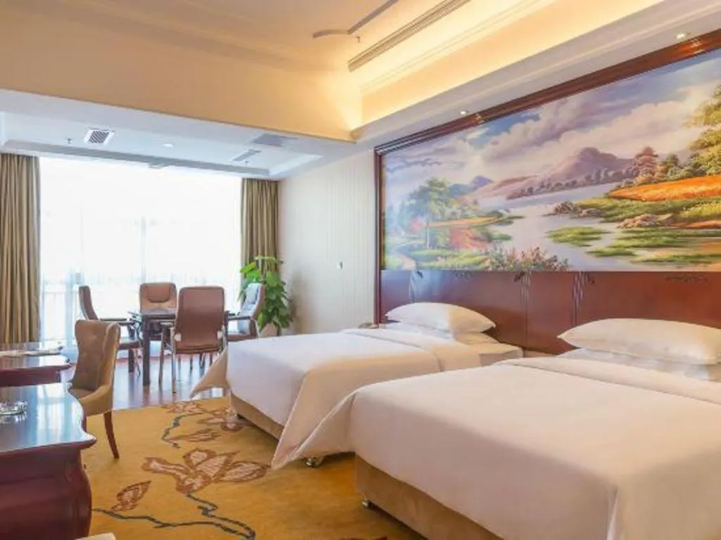 Bed in Vienna Hotel Jiangxi Ji'an Anfu