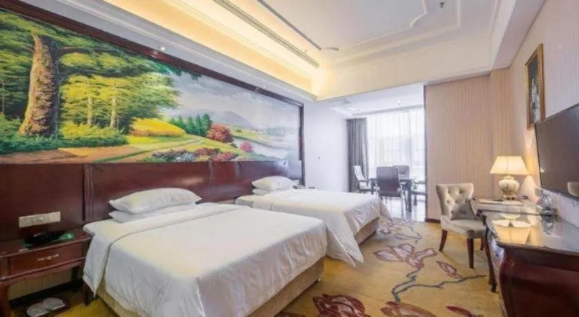 Bed in Vienna Hotel Jiangxi Ji'an Anfu