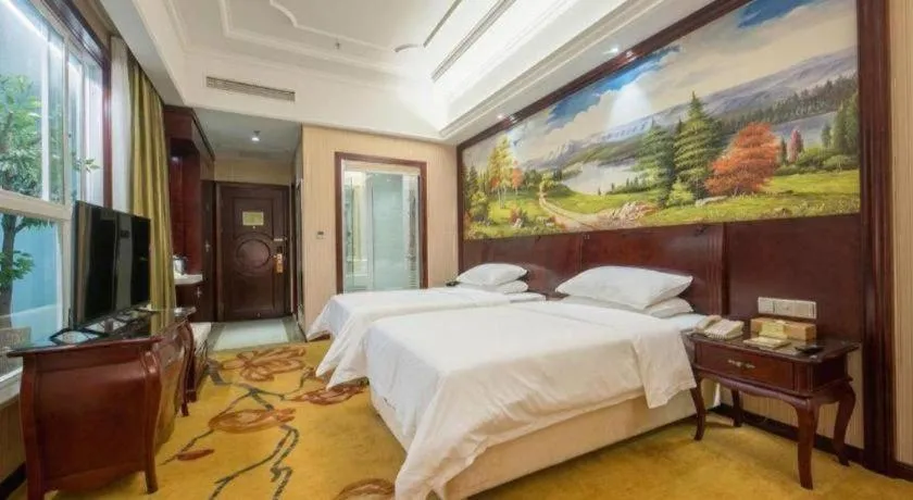 Bed in Vienna Hotel Jiangxi Ji'an Anfu