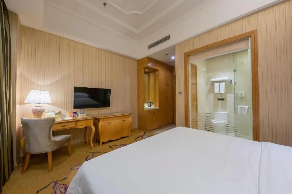 Bed in Vienna Hotel Jiangxi Ji'an Anfu