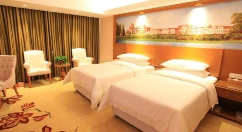 Bed in Vienna Hotel Jiangxi Ji'an Anfu