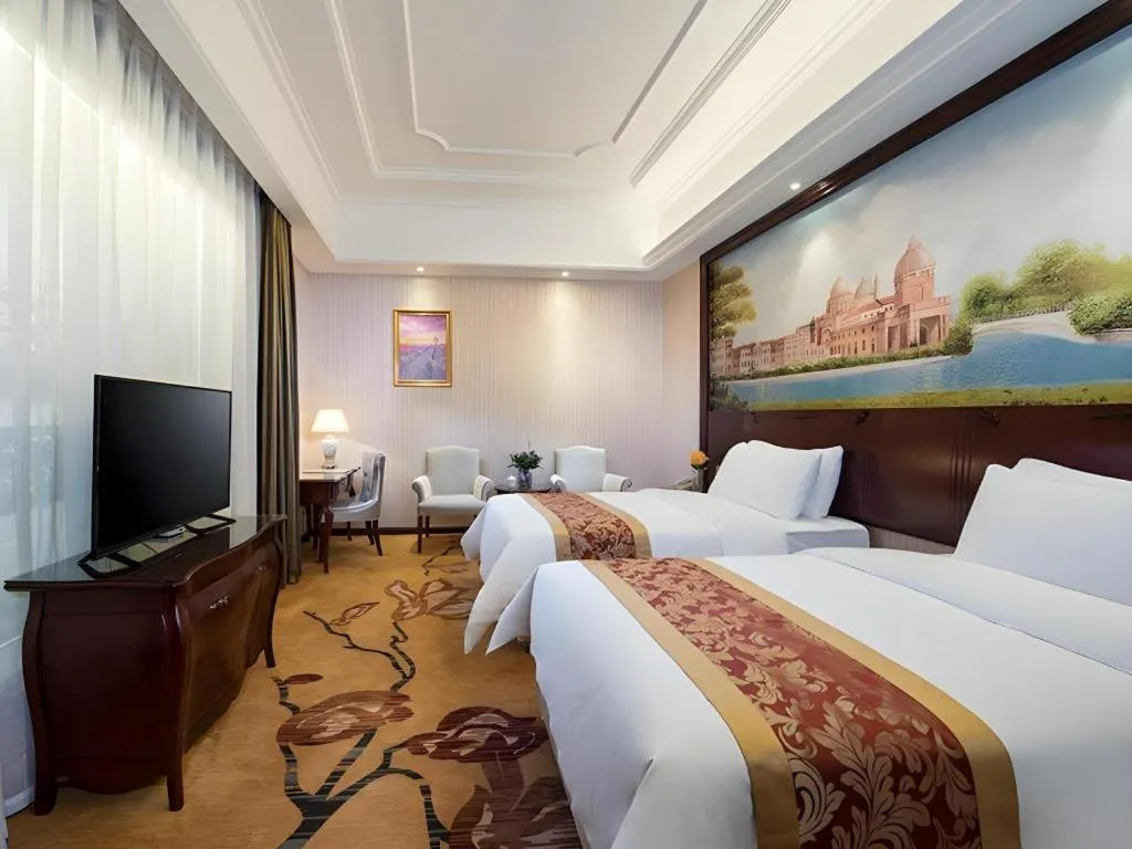 Bed in Vienna Hotel Jiangxi Ji'an Anfu