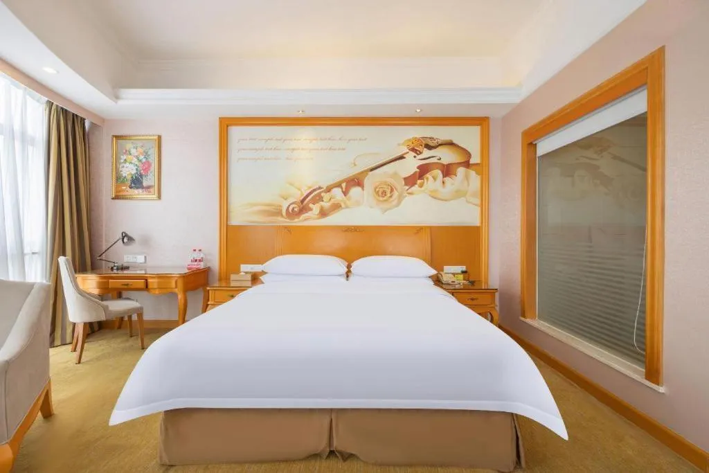 Bed in Vienna Hotel Guangdong Dongguan Chengnan Station