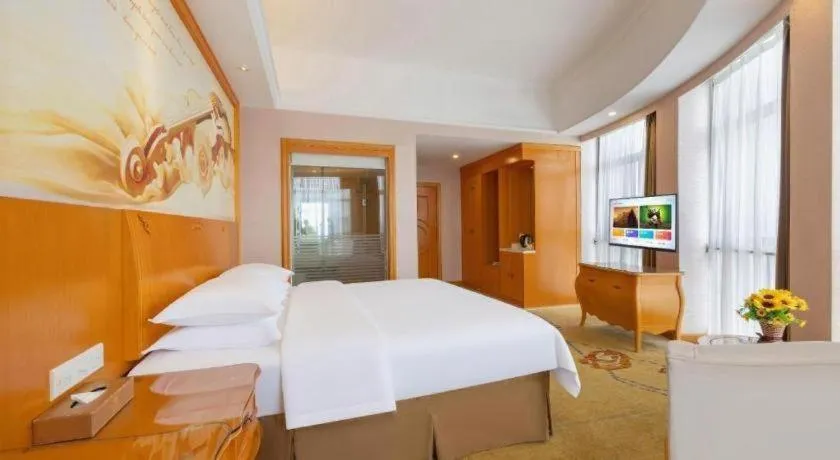 Bed in Vienna Hotel Guangdong Dongguan Chengnan Station