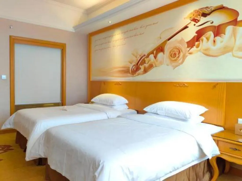 Bed in Vienna Hotel Guangdong Dongguan Chengnan Station