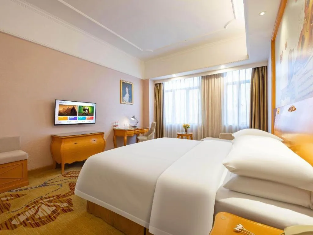 Bed in Vienna Hotel Guangdong Dongguan Chengnan Station
