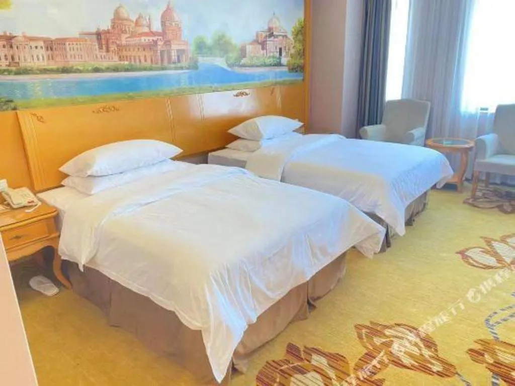 Bed in Vienna Hotel Guangdong Dongguan Chengnan Station