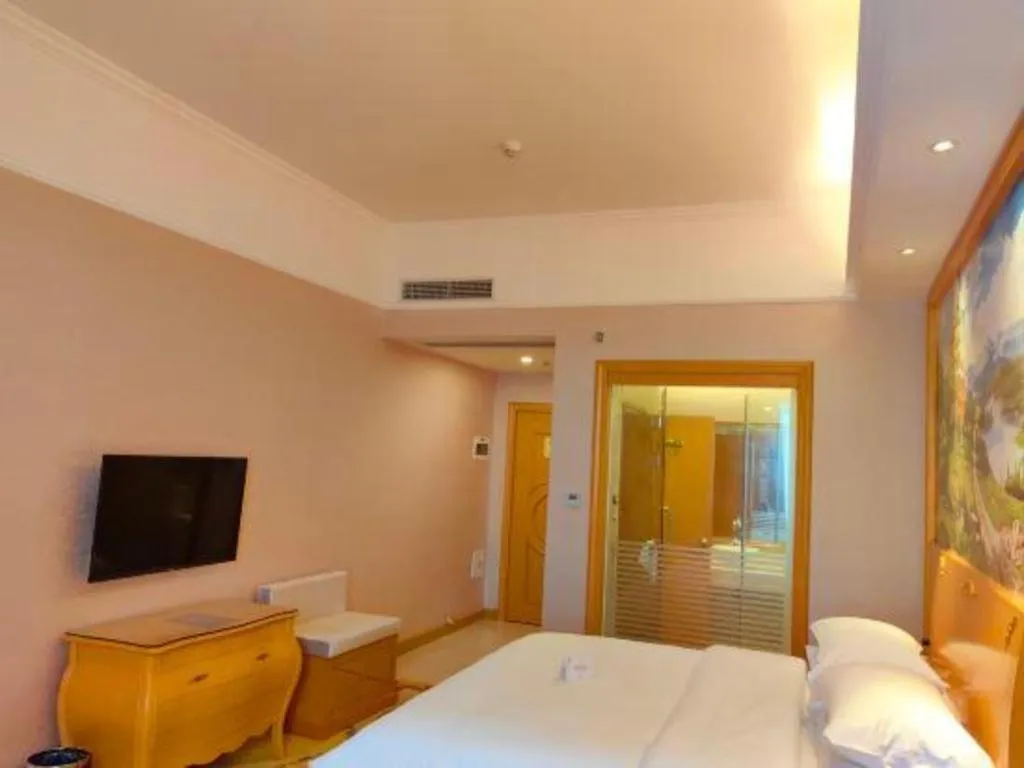 Bed in Vienna Hotel Guangdong Dongguan Chengnan Station