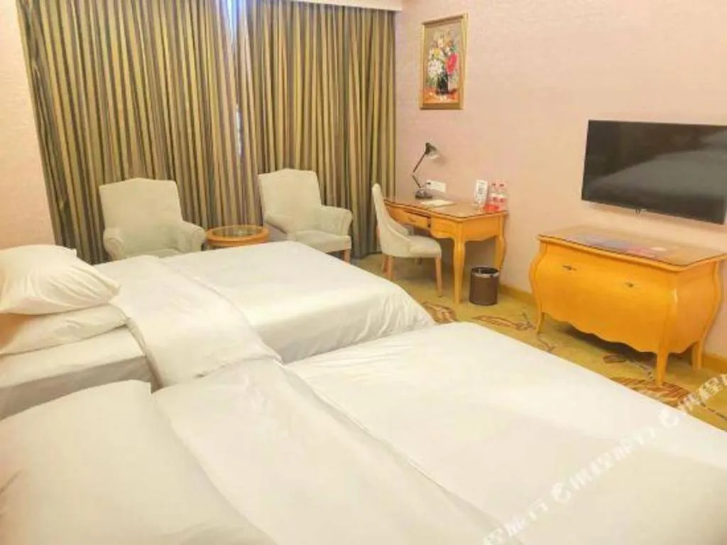Bed in Vienna Hotel Guangdong Dongguan Chengnan Station