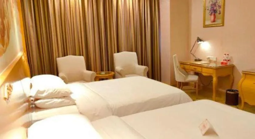 Bed in Vienna Hotel Guangdong Dongguan Chengnan Station