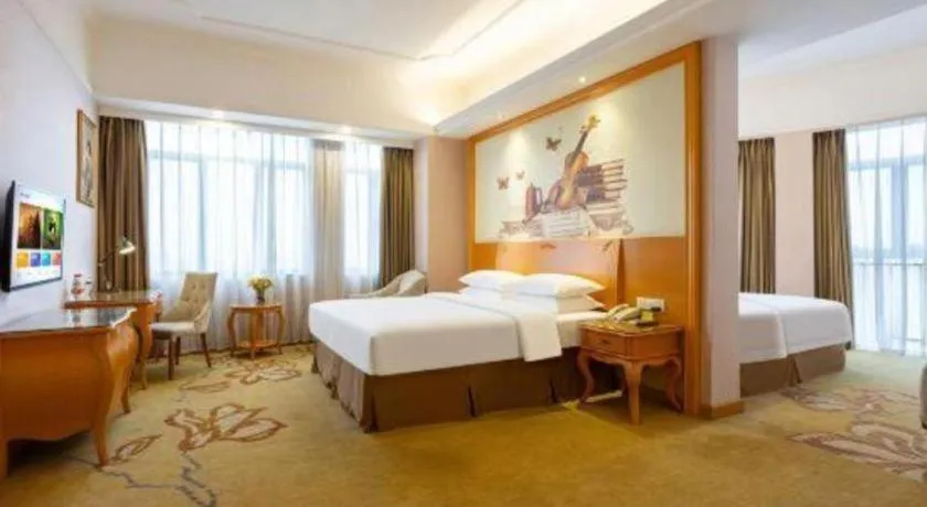 Bed in Vienna Hotel Guangdong Dongguan Chengnan Station