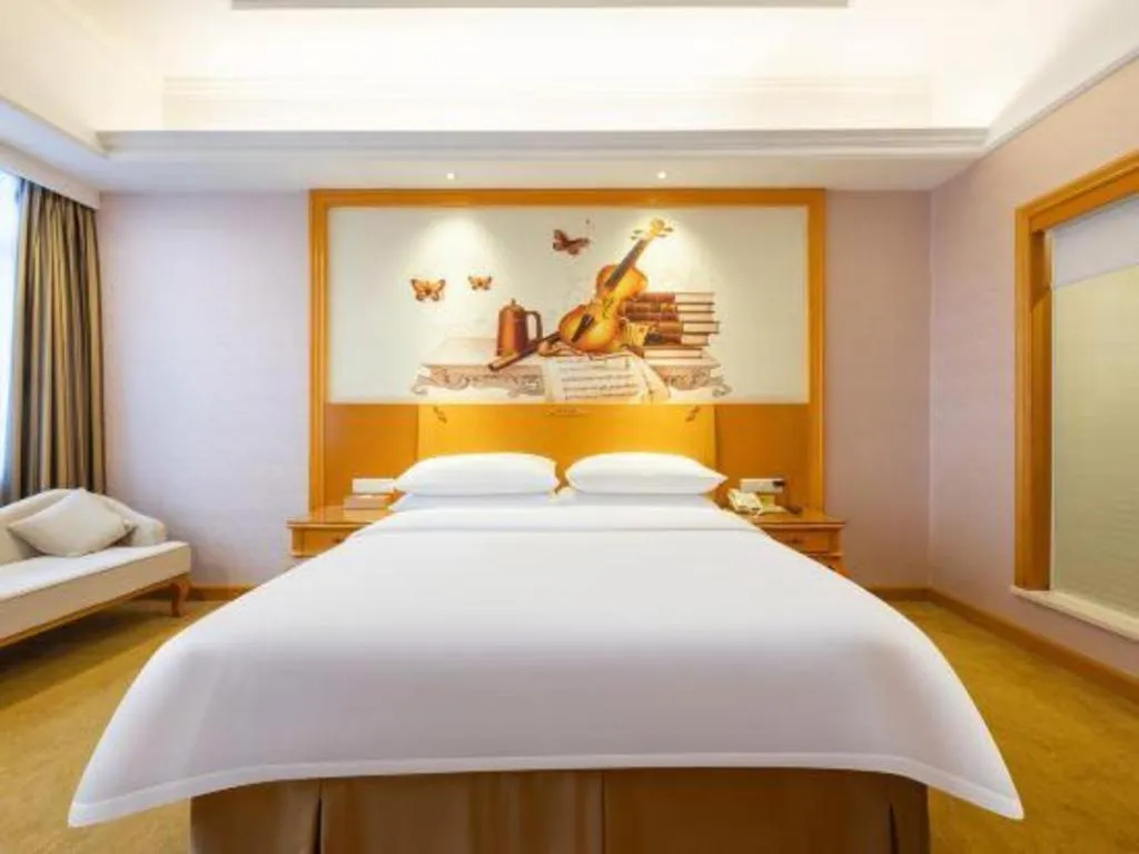Bed in Vienna Hotel Guangdong Dongguan Chengnan Station