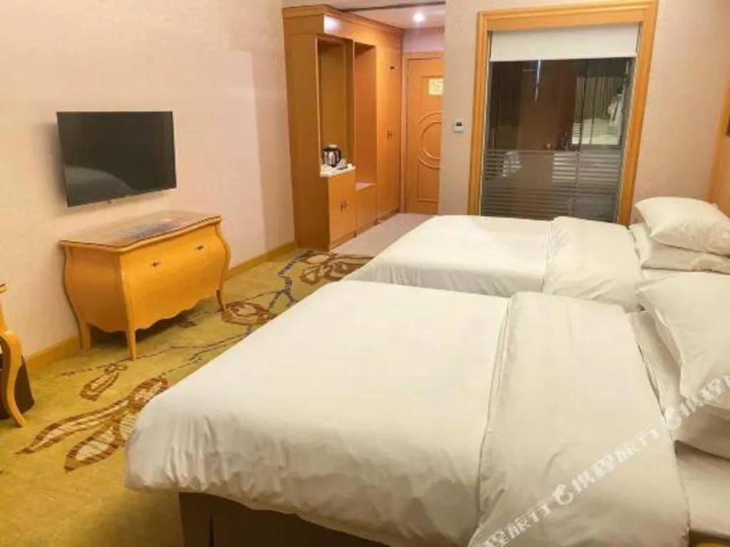 Bed in Vienna Hotel Guangdong Dongguan Chengnan Station