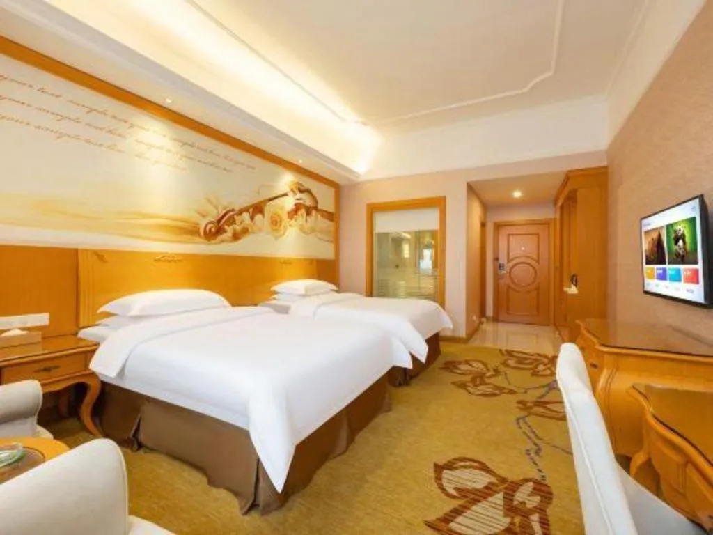 Bed in Vienna Hotel Guangdong Dongguan Chengnan Station