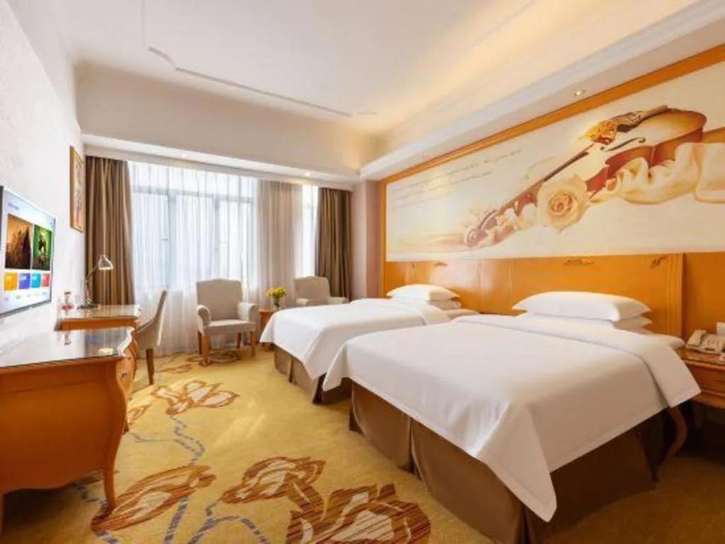 Bed in Vienna Hotel Guangdong Dongguan Chengnan Station