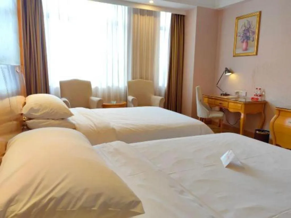 Bed in Vienna Hotel Guangdong Dongguan Chengnan Station