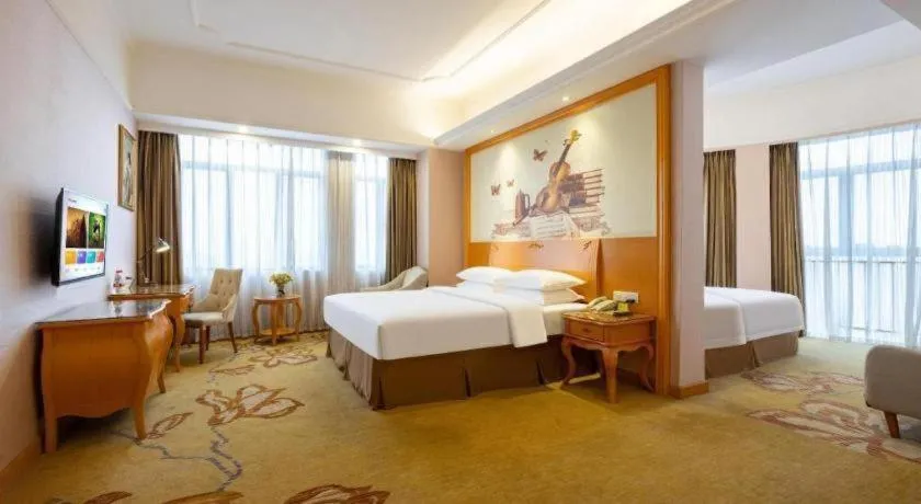Bed in Vienna Hotel Guangdong Dongguan Chengnan Station