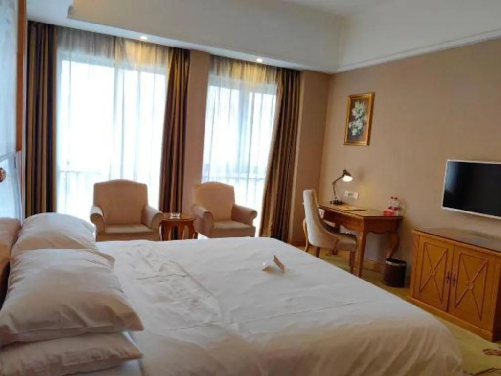 Bed in Vienna Hotel Guangdong Dongguan Chengnan Station