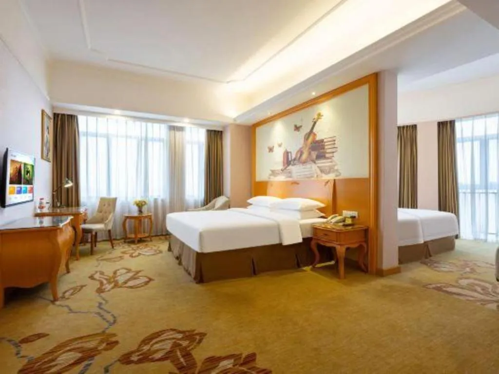 Bed in Vienna Hotel Guangdong Dongguan Chengnan Station