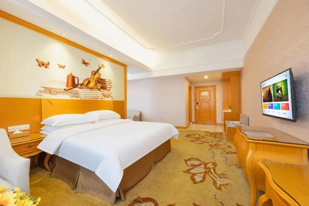 Bed in Vienna Hotel Guangdong Dongguan Chengnan Station