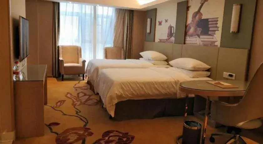 Bed in Vienna Hotel Changsha Wanjia Libei Road Tuqiao Metro Station Bed in Vienna Hotel Changsha Wanjia Libei Road Tuqiao Metro Station