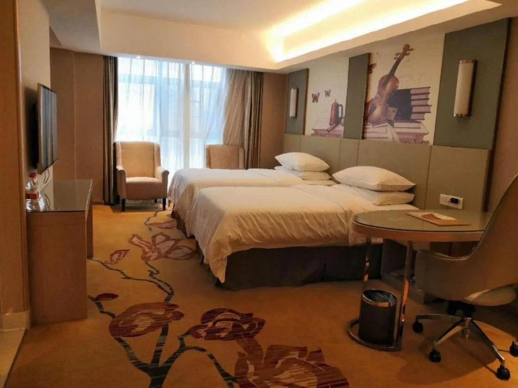 Bed in Vienna Hotel Changsha Wanjia Libei Road Tuqiao Metro Station